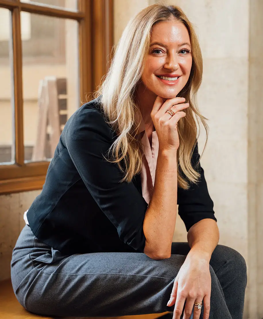 A professional portrait of Dr. Meaghan Noud smiling, seated in a well-lit office setting.